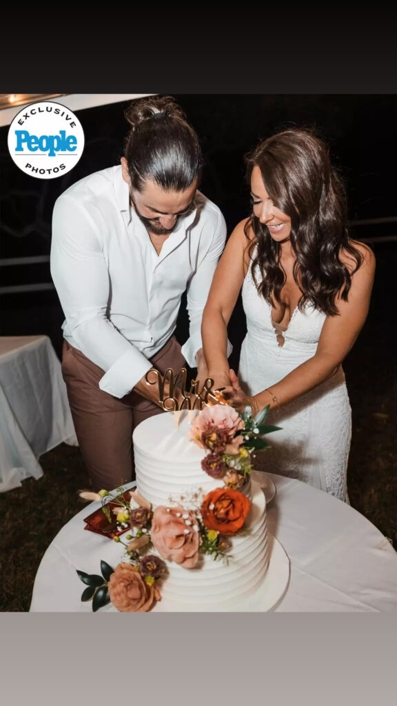 bride and groom cutting a wedding cake