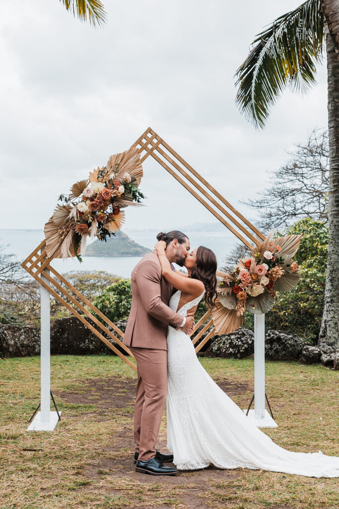 adventurous bride and groom during their hawaii destination elopement ceremony