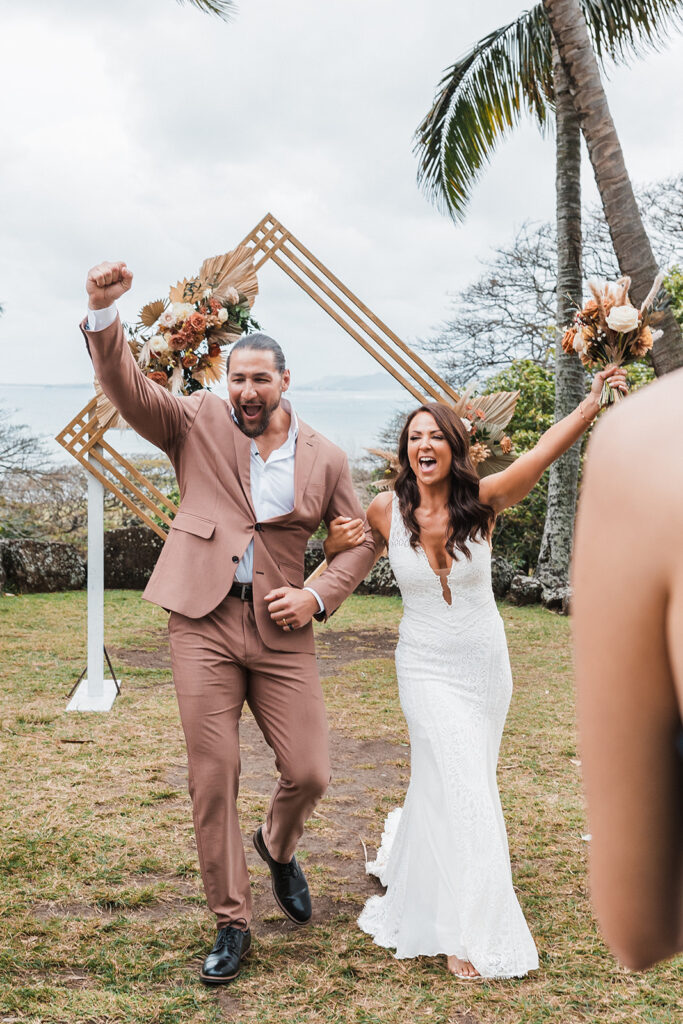 adventurous bride and groom during their hawaii destination elopement ceremony